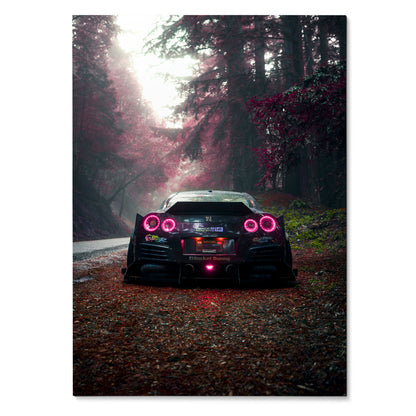 Nissan GTR R35 Widebody rear view on forest road poster wall art with glowing taillights.