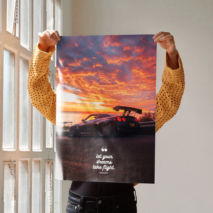 Motivational poster wall art featuring Nissan R35 GT-R with sunset sky and inspiring text.