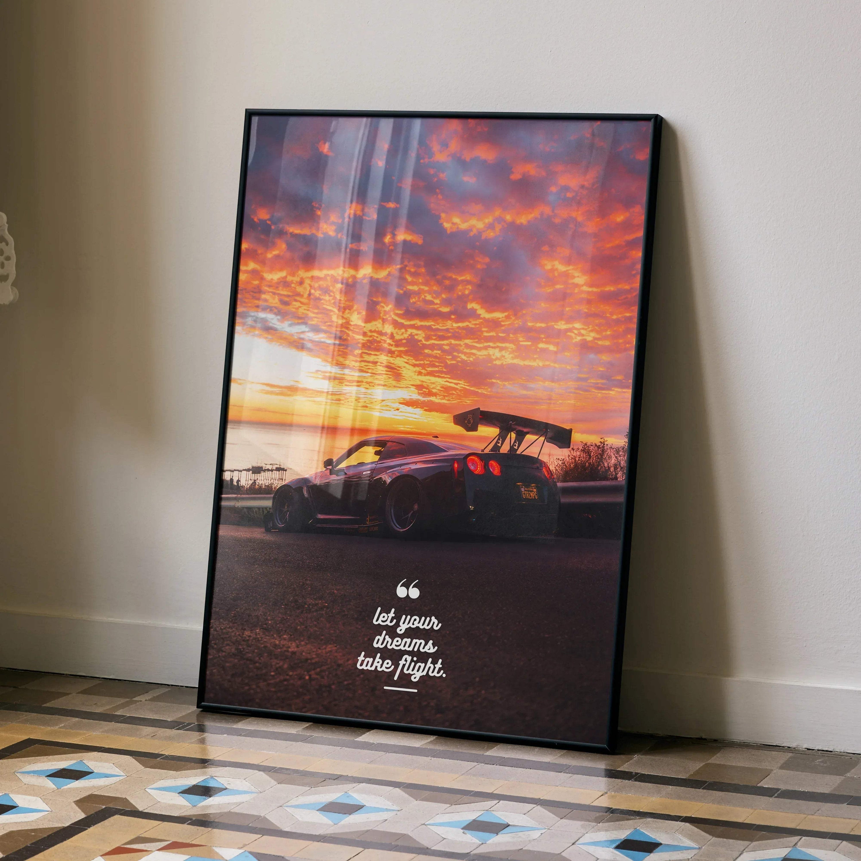 Motivational poster wall art featuring Nissan R35 GT-R silhouette at sunset with inspiring text.