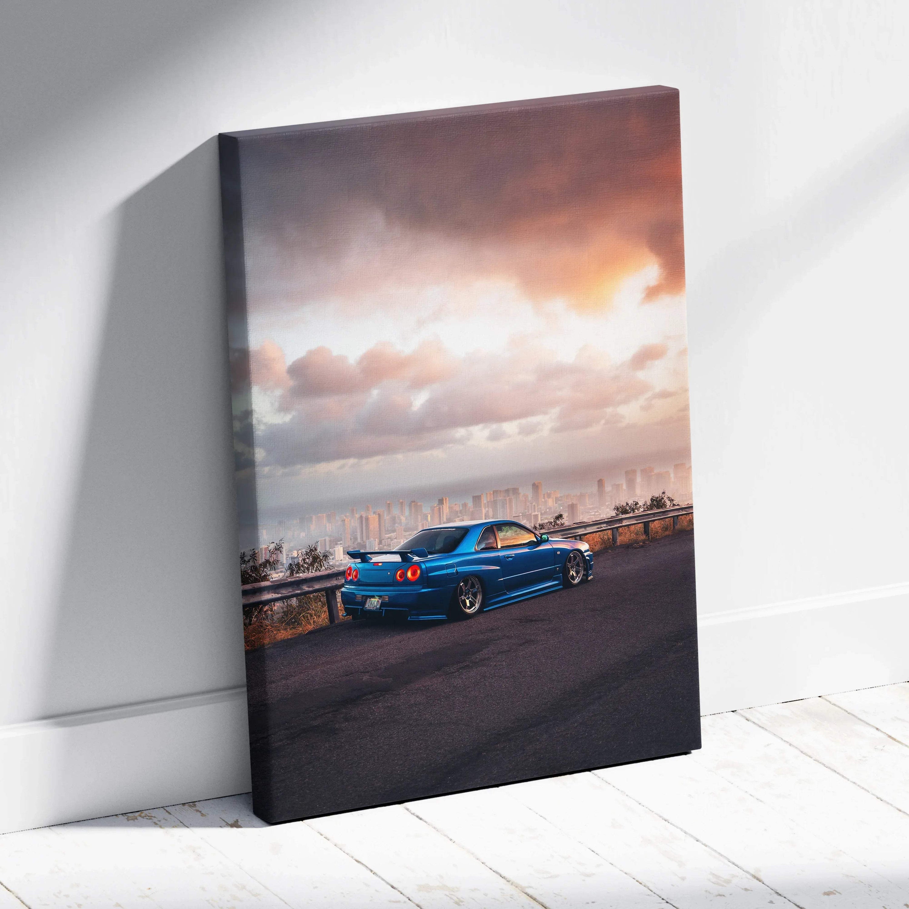 Blue Nissan R34 GTR parked at sunset with dramatic sky on vertical canvas wall art.