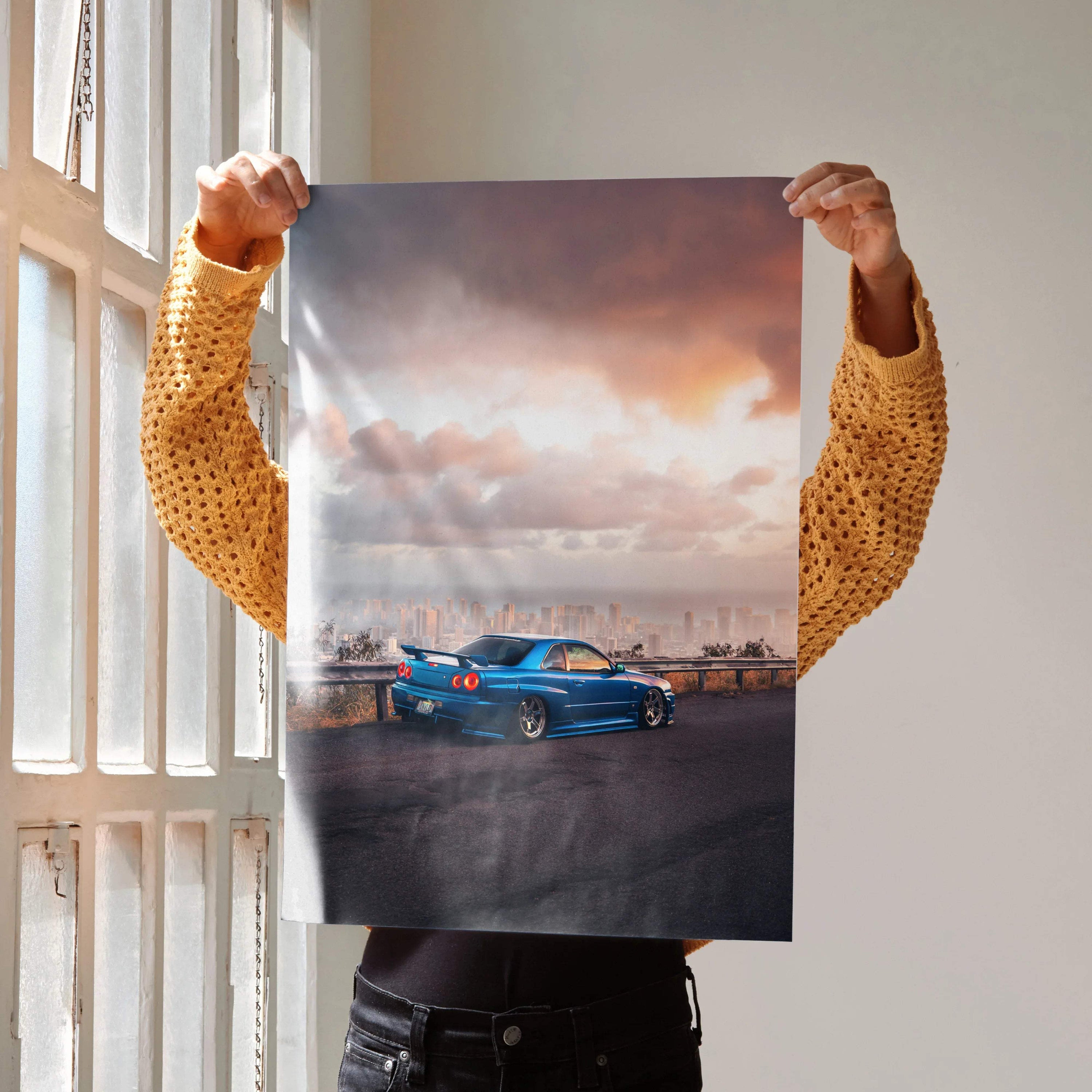 Nissan Skyline GTR R34 blue car poster with sunset background and urban skyline wall art.