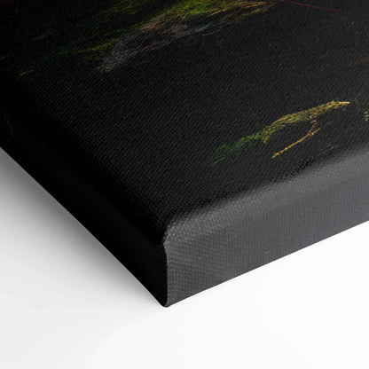 Close-up of black canvas wall art with textured surface and subtle green and yellow forest details.