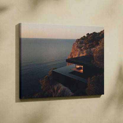 Canvas wall art featuring modern cliffside architecture overlooking calm ocean at sunset.