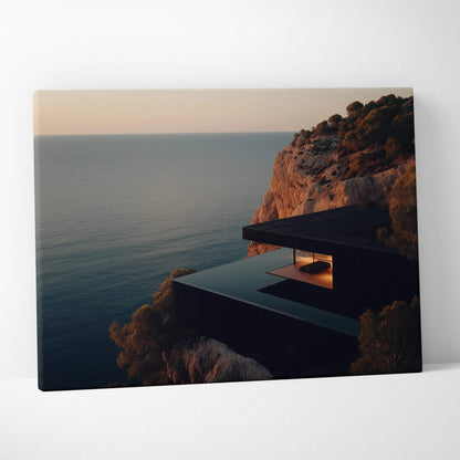 Canvas wall art featuring modern architectural structure on cliffside overlooking calm ocean at sunset.