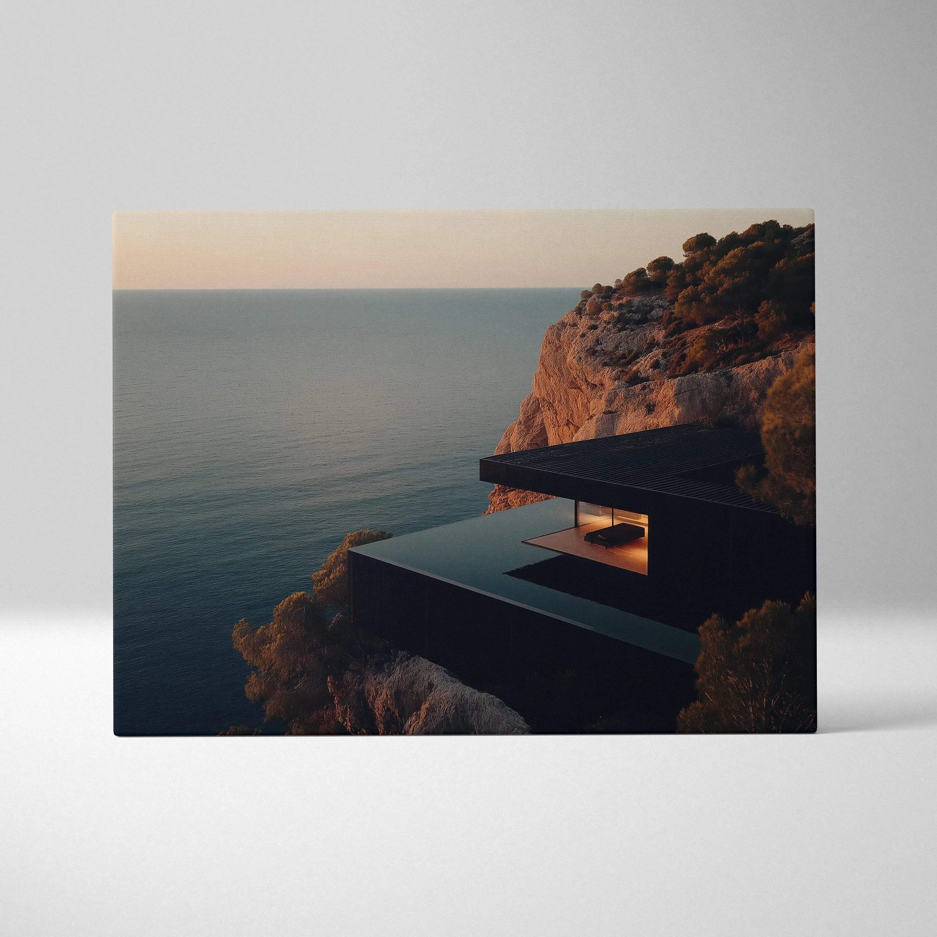 Canvas wall art featuring modern architecture with a sleek black house on a cliff at sunset.