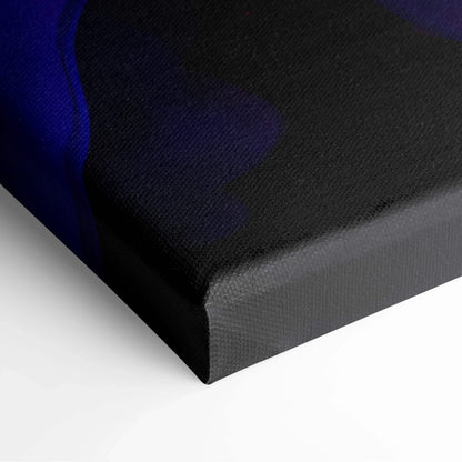 Close-up of vibrant abstract digital art on black and blue canvas wall art corner.