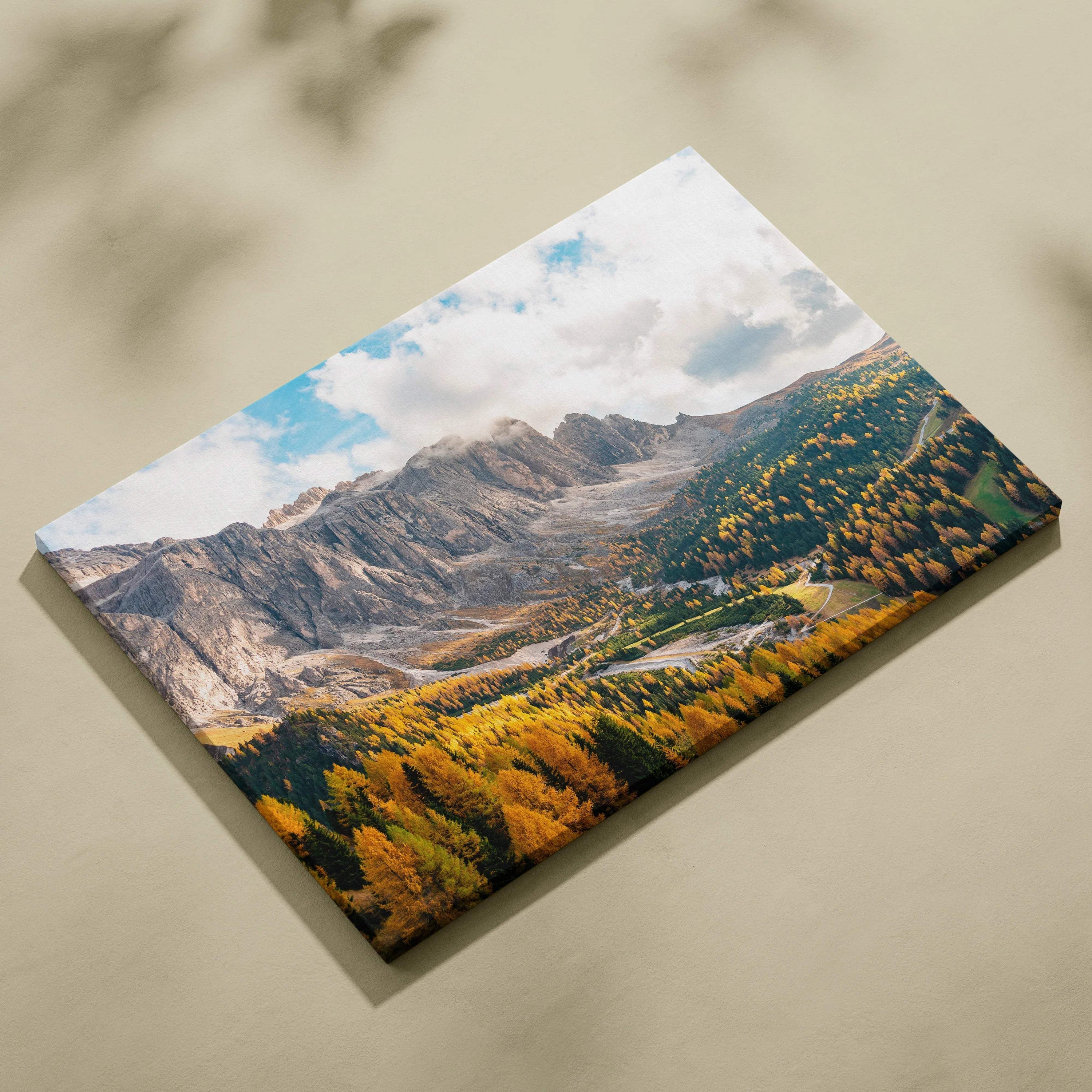 Canvas print of dramatic Dolomites mountains with autumn forests at golden hour