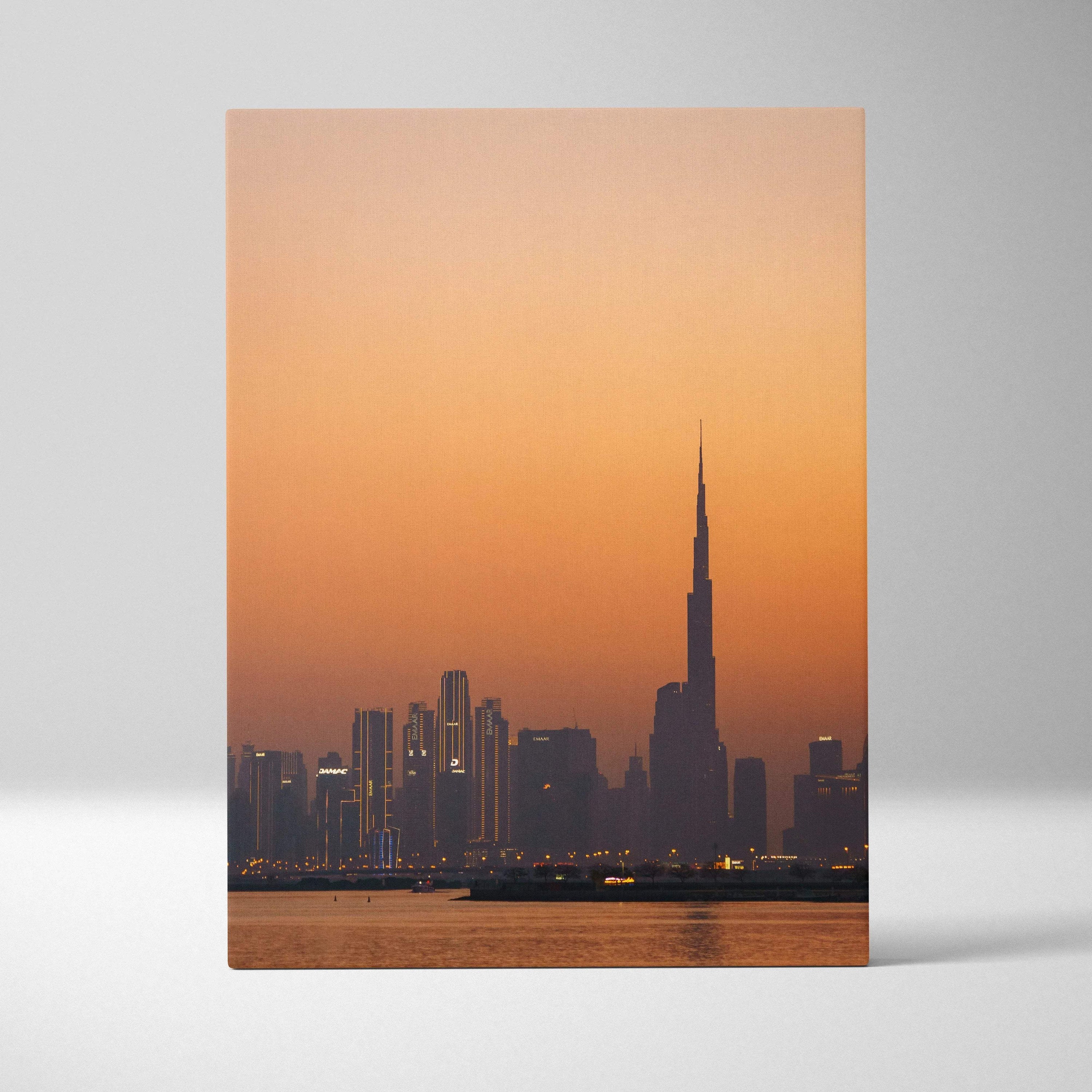 Dubai skyline canvas art featuring iconic buildings at sunset, vertical wall art on canvas.