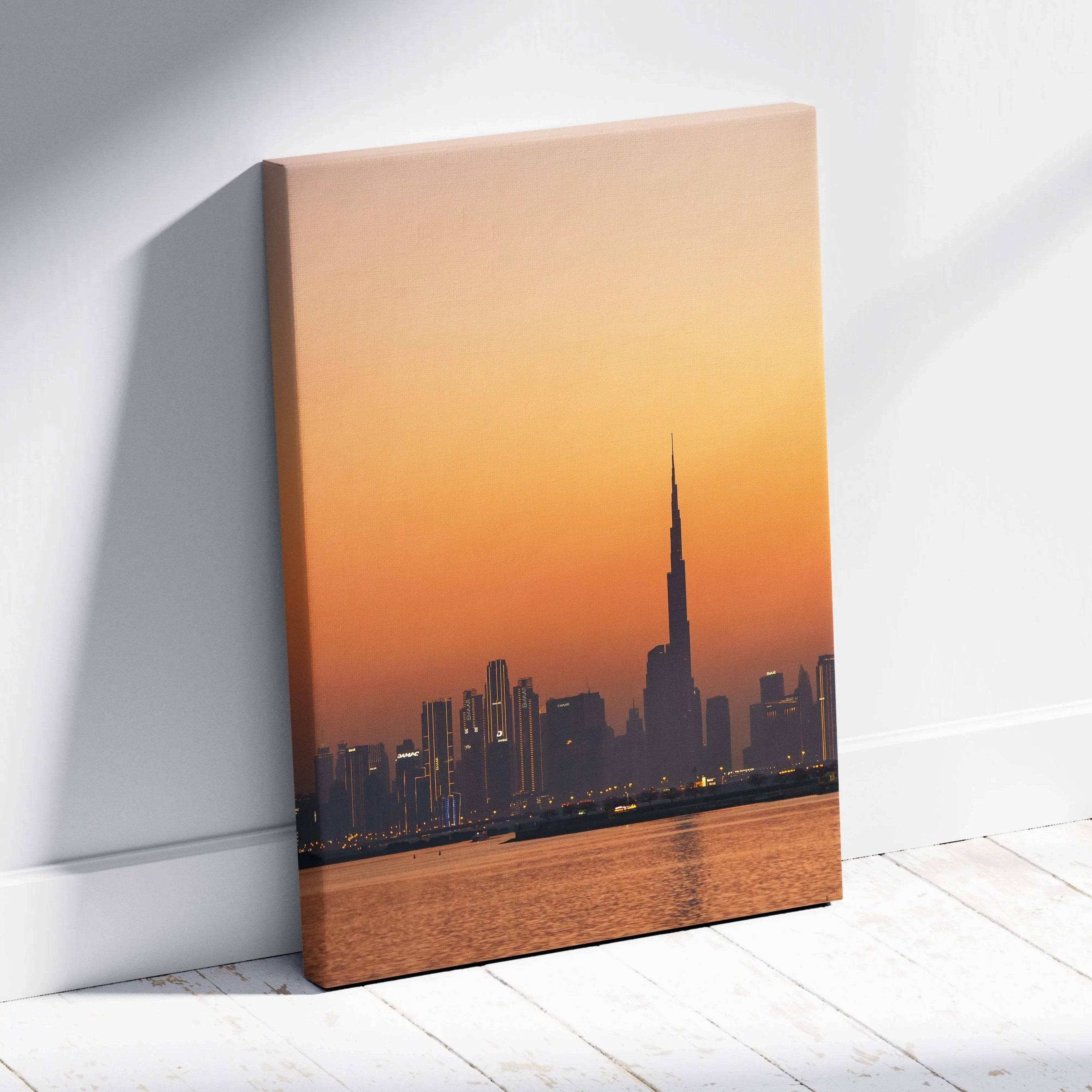 Canvas wall art featuring Dubai skyline at sunset with warm orange and yellow tones.