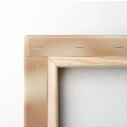 Close-up of wooden frame corner with beige stretched canvas for minimalist wall art decor.