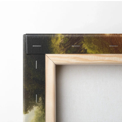 Close-up of canvas corner showing wooden frame and forest sunset wall art decor with green and brown tones.