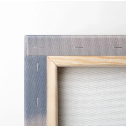 Close-up of wooden frame corner and stretched canvas for wall art decor.