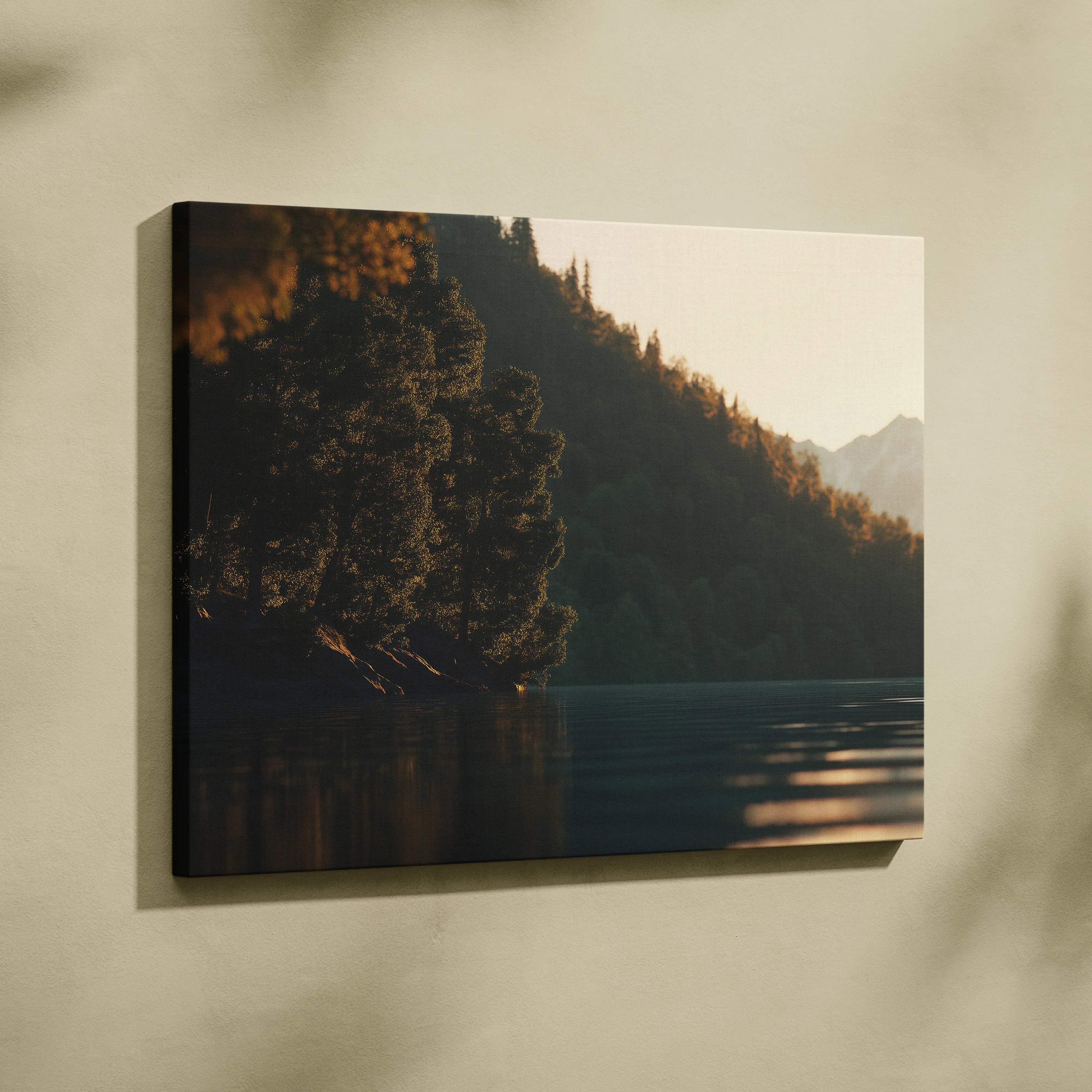 A rectangular canvas print of a tranquil golden hour sunset landscape with lakeside pines and warm tones