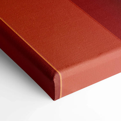 Modern abstract canvas art with rich red and burnt orange tones, textured surface on gallery-wrapped edges.