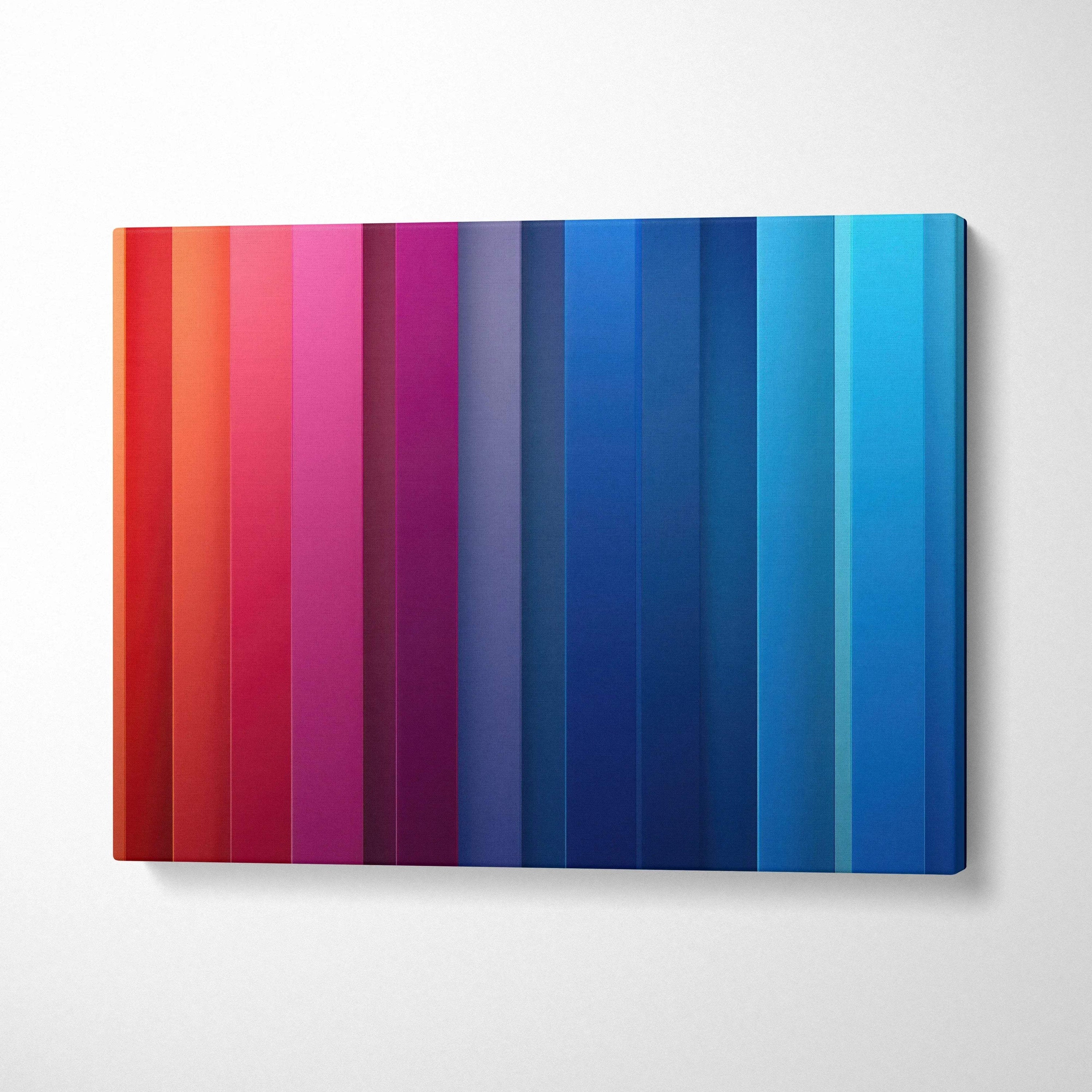 Modern abstract canvas art with vertical gradient stripes in red, pink, purple, and blue tones on wall art canvas.