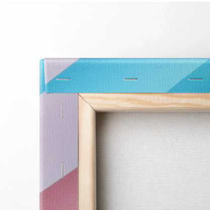 Corner of vibrant abstract digital canvas wall art with blue, purple, and pink geometric shapes and natural wood frame.