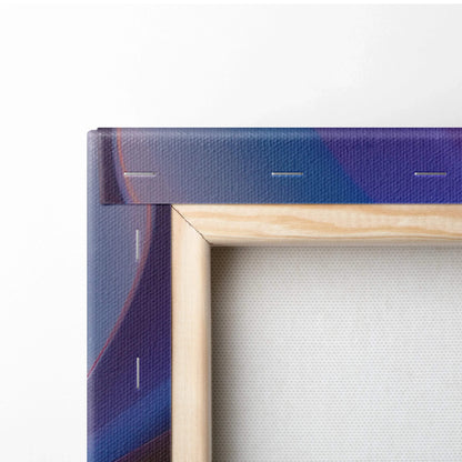 Close-up of wooden frame corner with vibrant purple and blue abstract digital print on stretched canvas wall art.