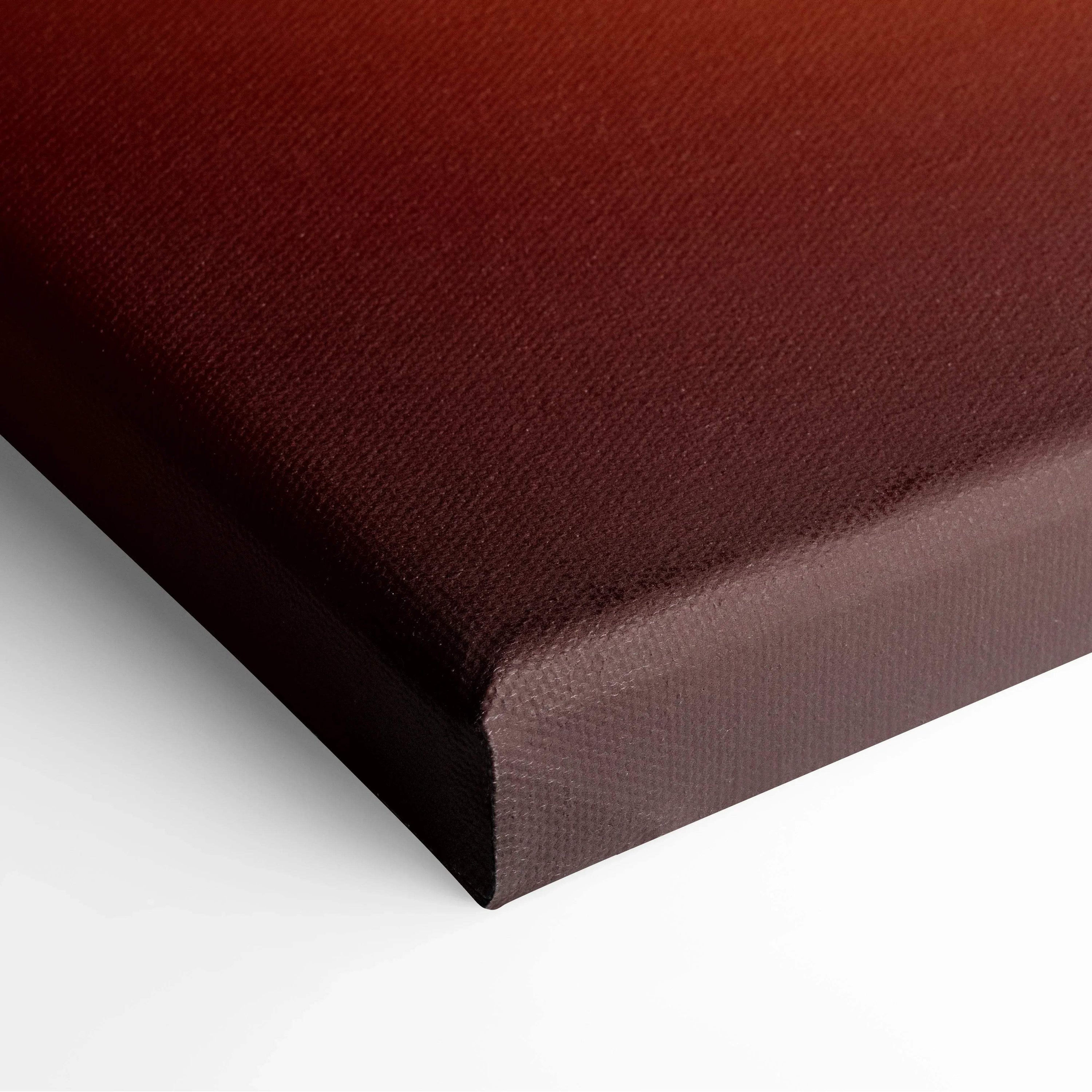 Close-up of canvas edge showing deep red and brown abstract digital art on textured canvas wall art.