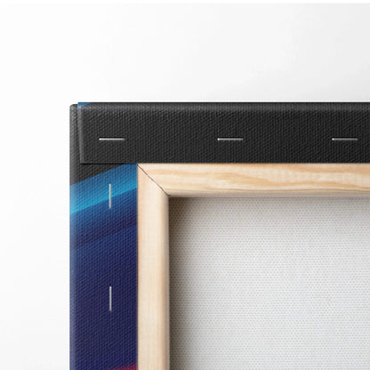 Close-up of vibrant abstract digital canvas wall art with natural wooden stretcher bars and black wrapped sides.