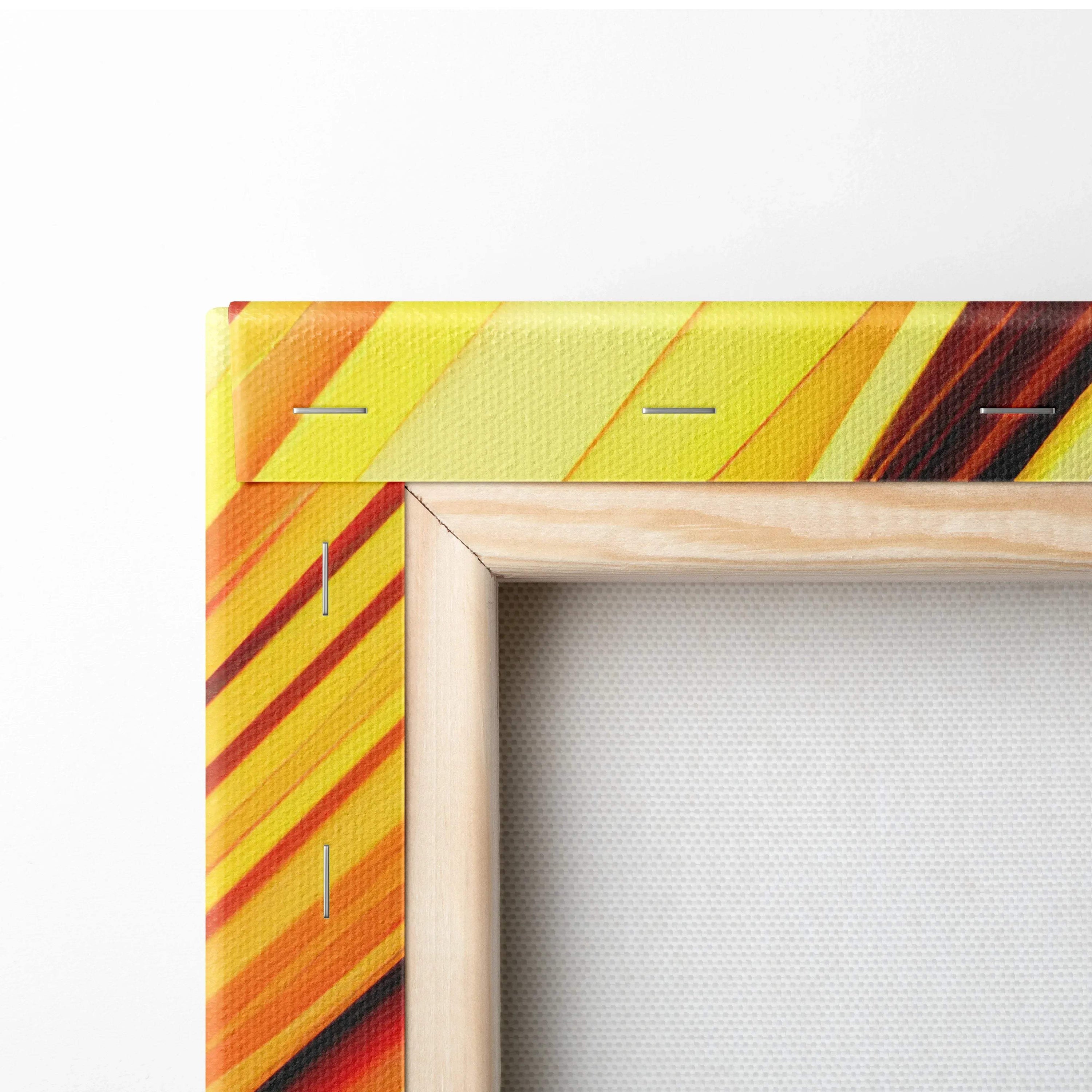 Abstract digital art canvas print with multicolored diagonal stripes in yellow, orange, and red on wooden stretcher bars.