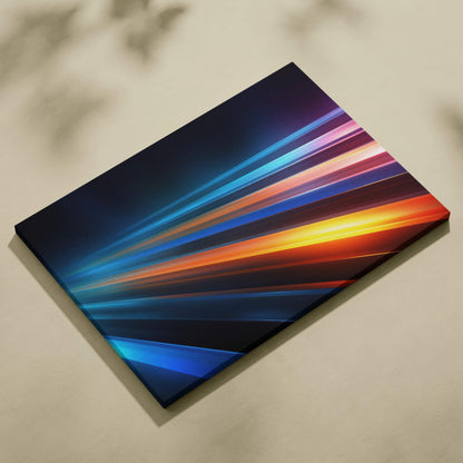 Abstract canvas art featuring dynamic diagonal streaks in blue, orange, pink, and black tones on a stretched canvas.