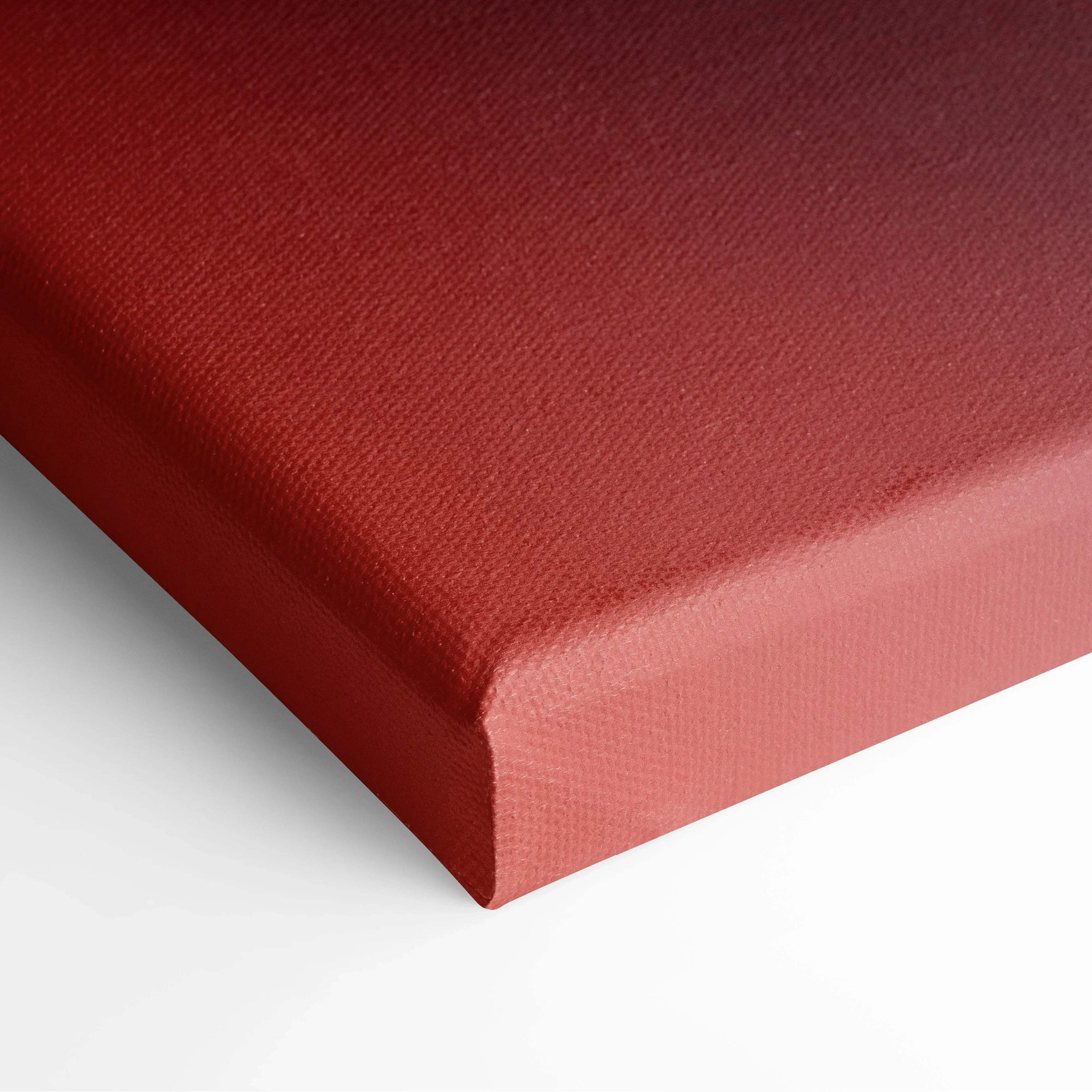 Red canvas wall art with a smooth textured surface and sharp stretched corners.