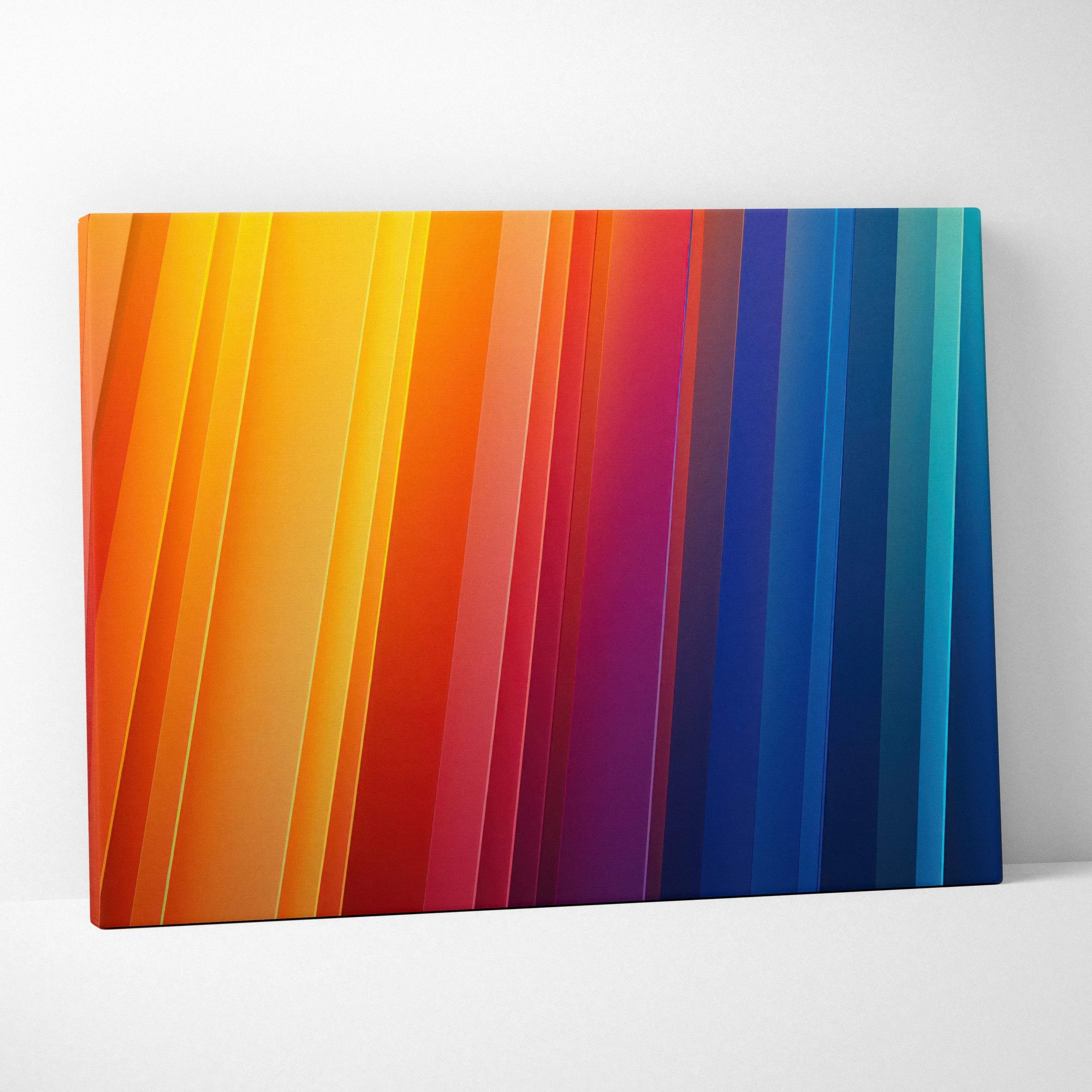 Abstract canvas wall art with vertical gradient stripes in warm orange, red, and cool blue tones.
