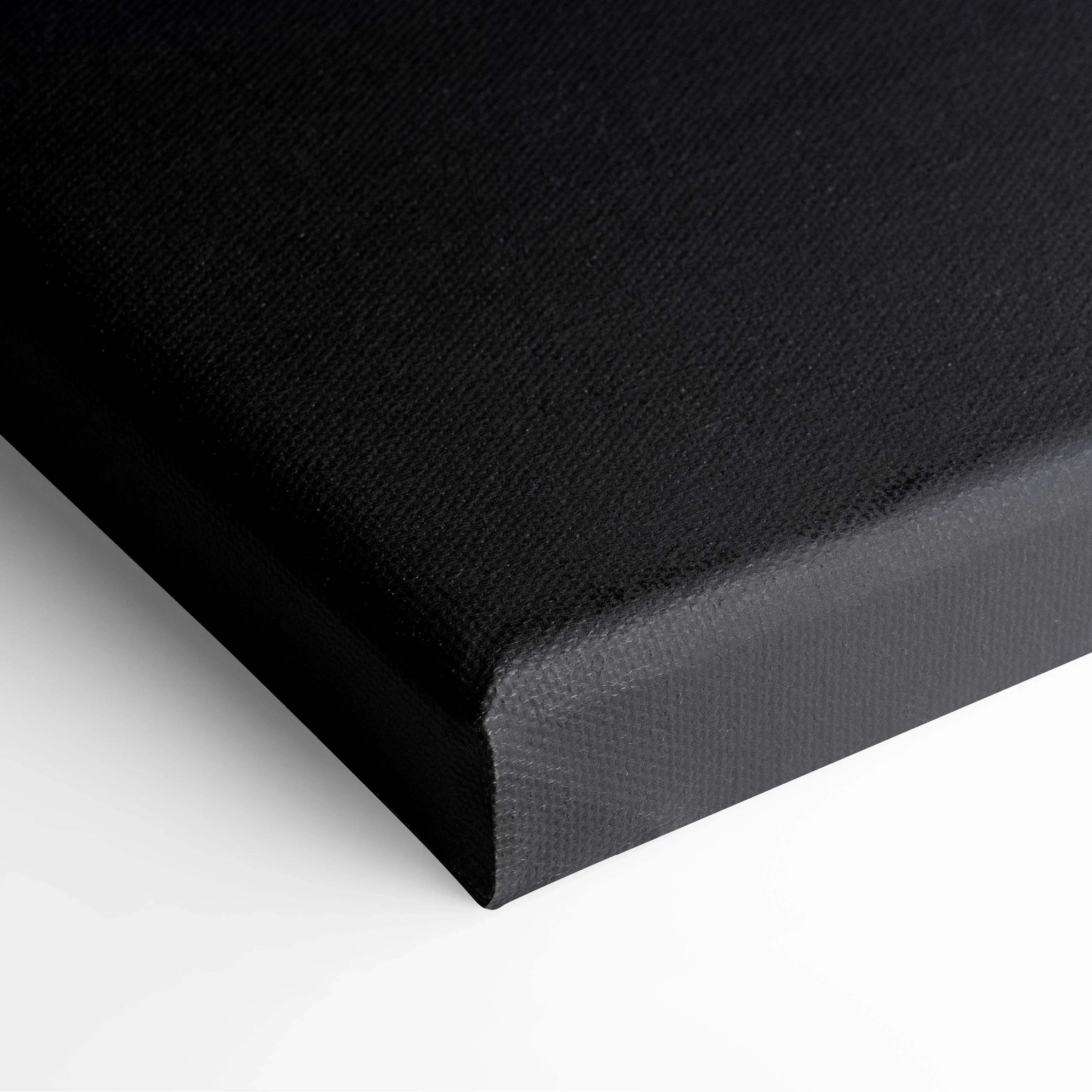 Black textured canvas stretched over wooden frame for modern wall art decor.