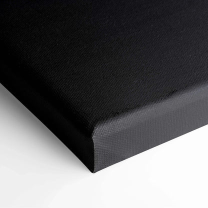 Black textured canvas stretched over wooden frame for modern wall art decor.