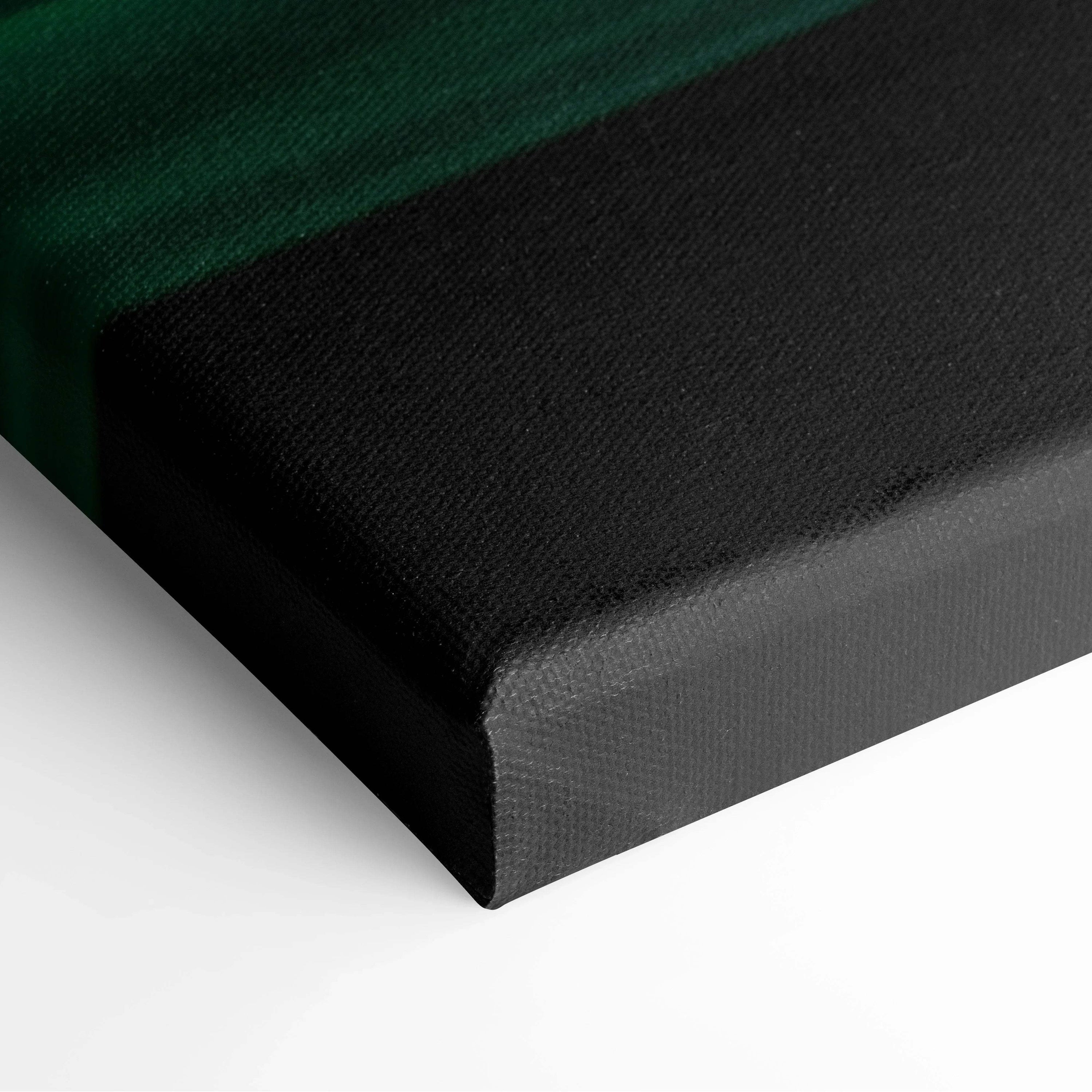 Close-up of canvas wall art corner with deep green and black abstract digital painting on textured fabric material.