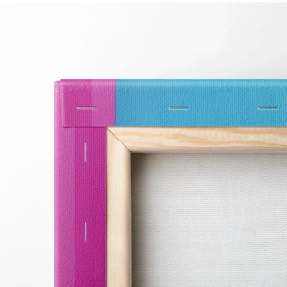 Close-up of a stretched canvas print with blue and purple abstract colors, wooden frame visible from the back.