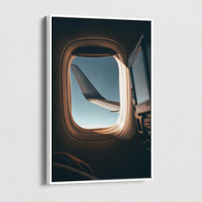 Vertical canvas wall art showing airplane wing through window with soft natural light.