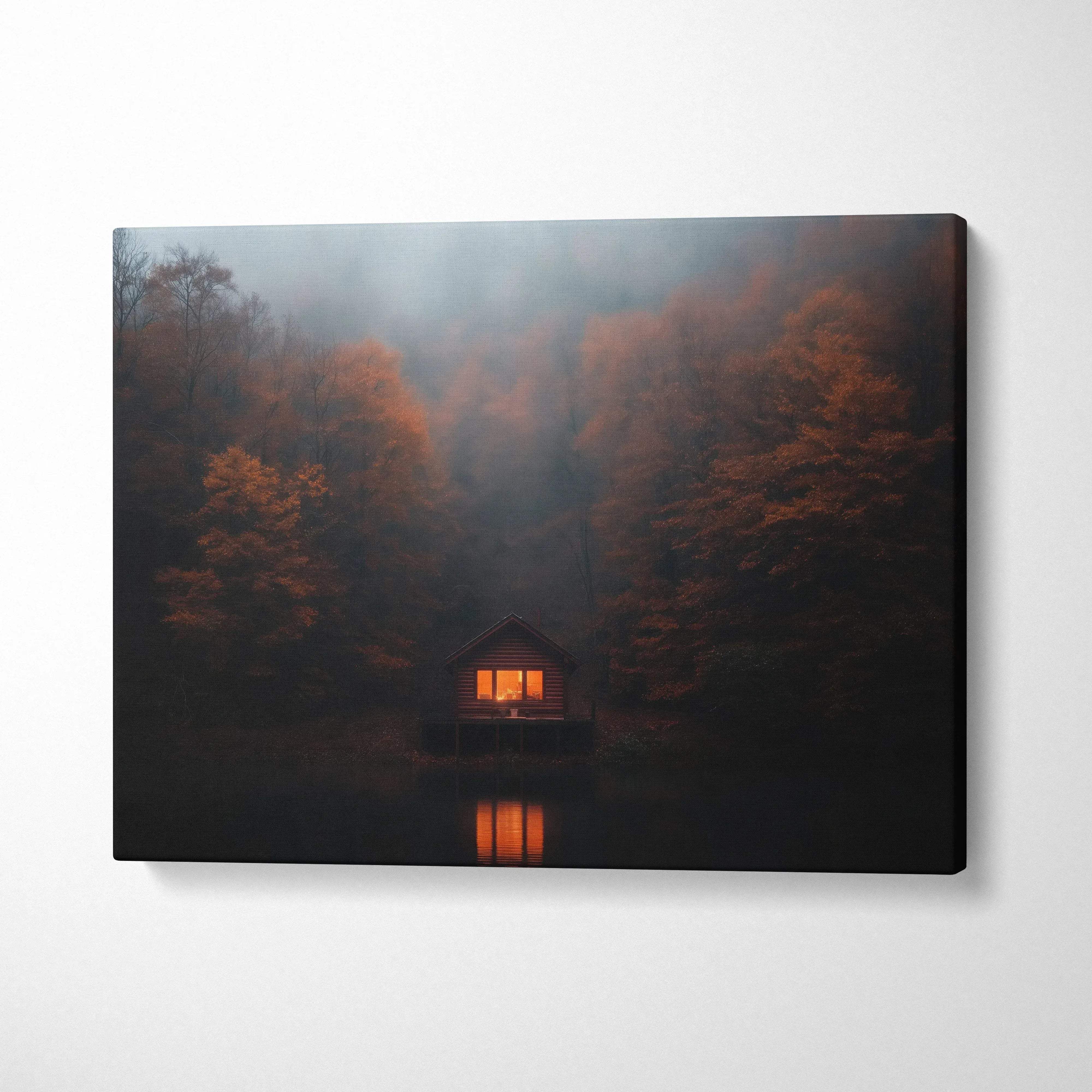 Canvas wall art of a glowing cabin nestled in a misty autumn forest at dusk.
