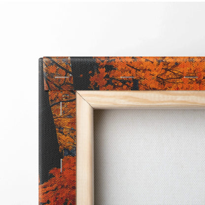 Canvas wall art with wooden frame featuring vibrant orange autumn leaves in a nature scene.
