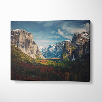 A rectangular canvas print of yosemite valley mountain landscape with snow-capped peaks autumn forests and waterfall decor