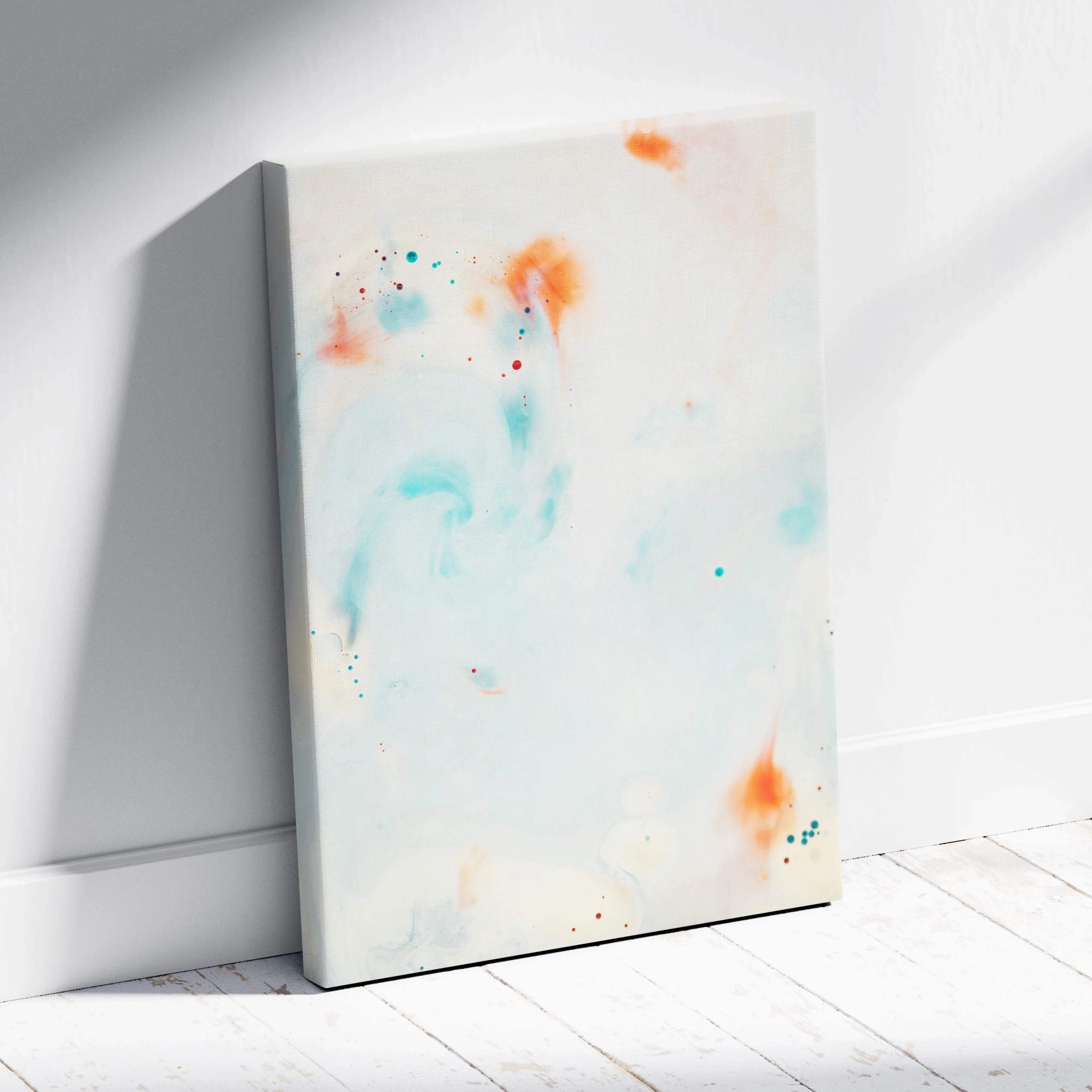 Modern abstract canvas with teal orange watercolor swirls on white wall