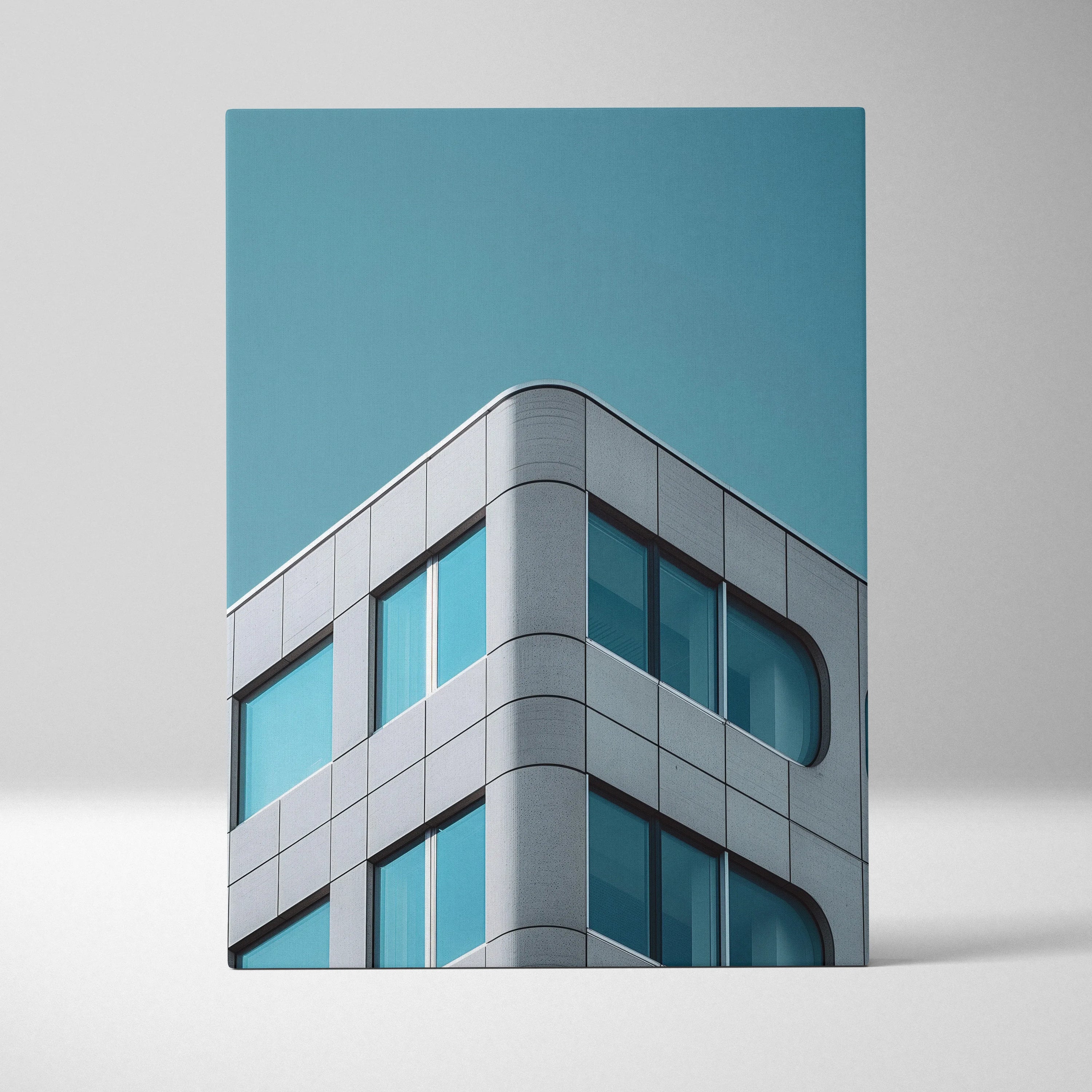 Modern architecture digital wall art canvas featuring curved glass and gray paneling against clear blue sky.