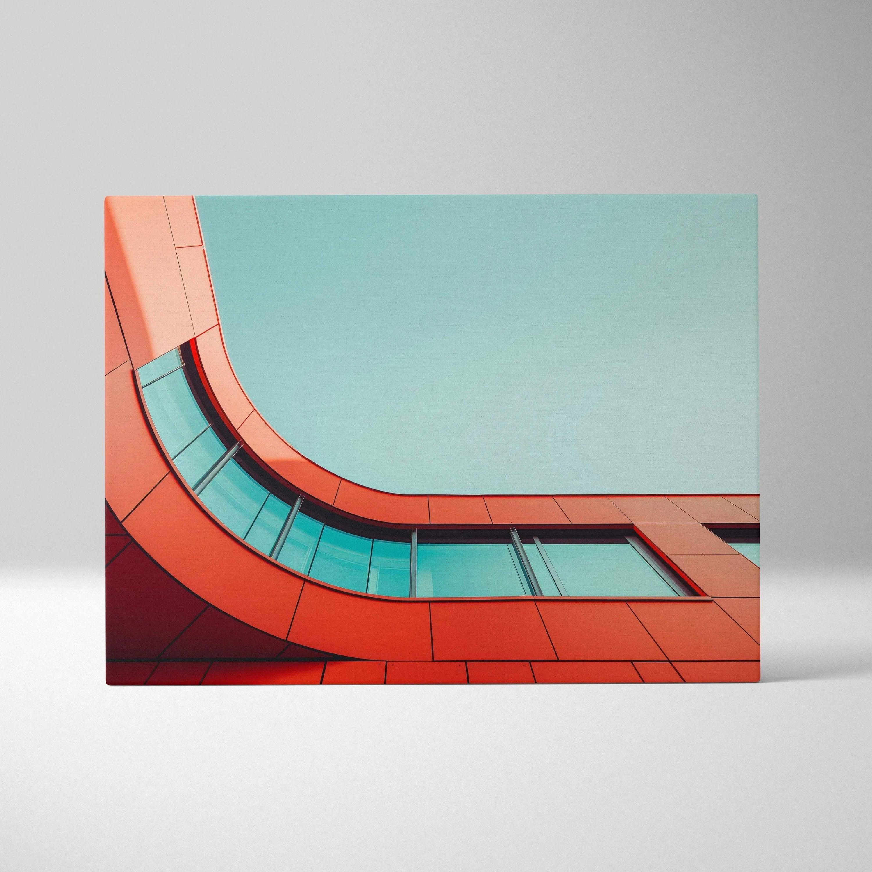 Modern architecture digital art canvas print with bold red and turquoise geometric shapes against a clear sky background.