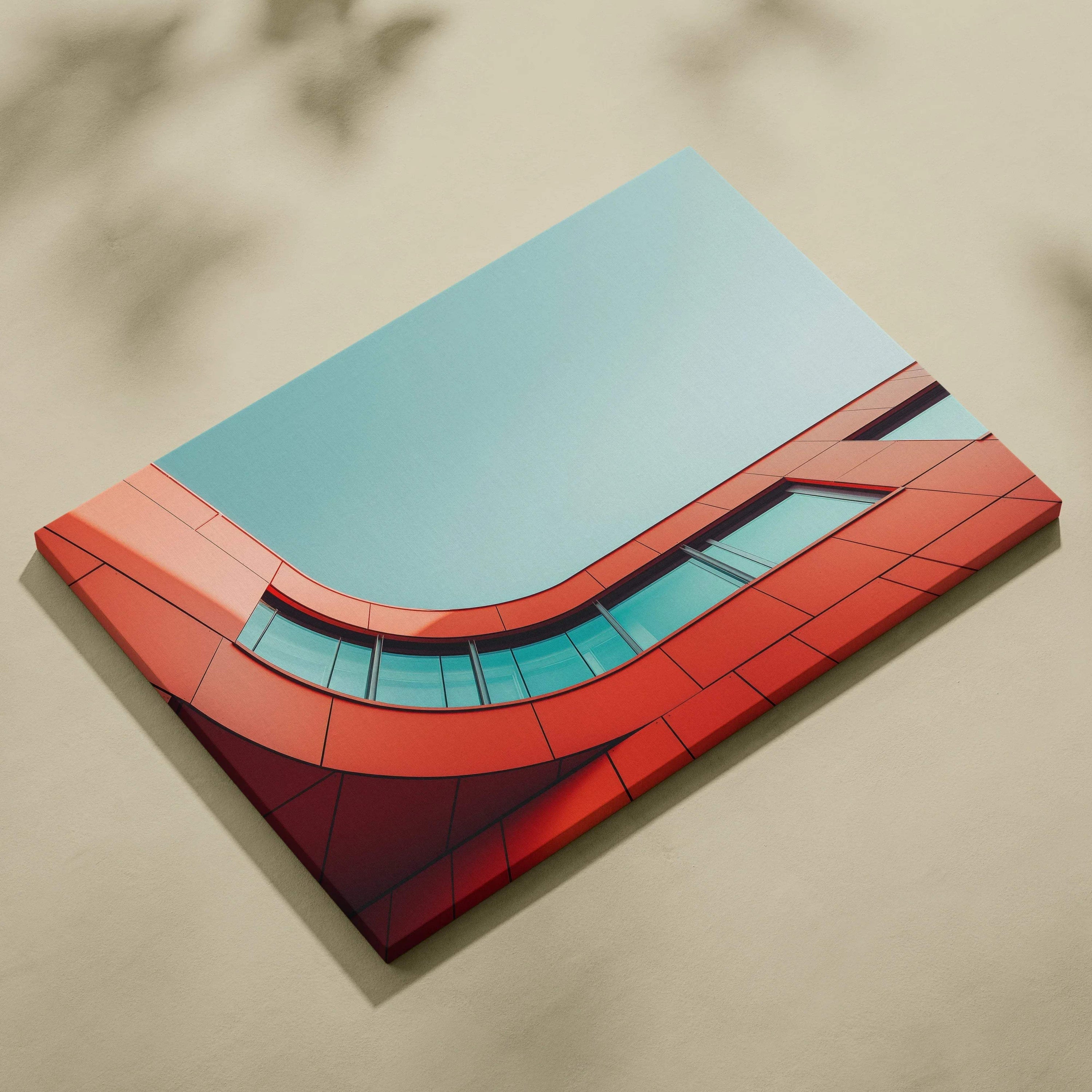 Canvas wall art featuring modern architecture with curved red panels and blue glass against clear sky.