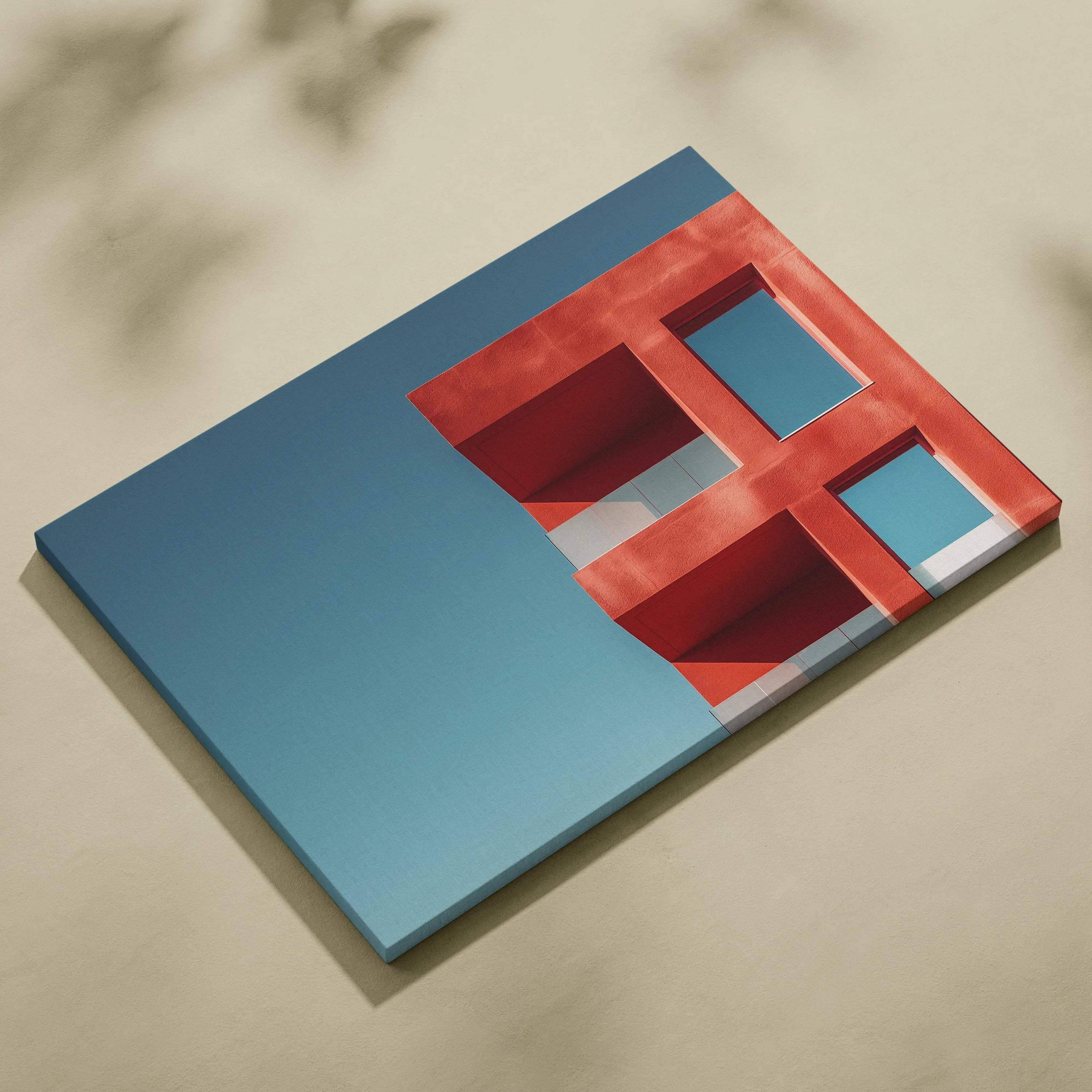 Abstract digital canvas art featuring red geometric building shapes against a blue sky background.