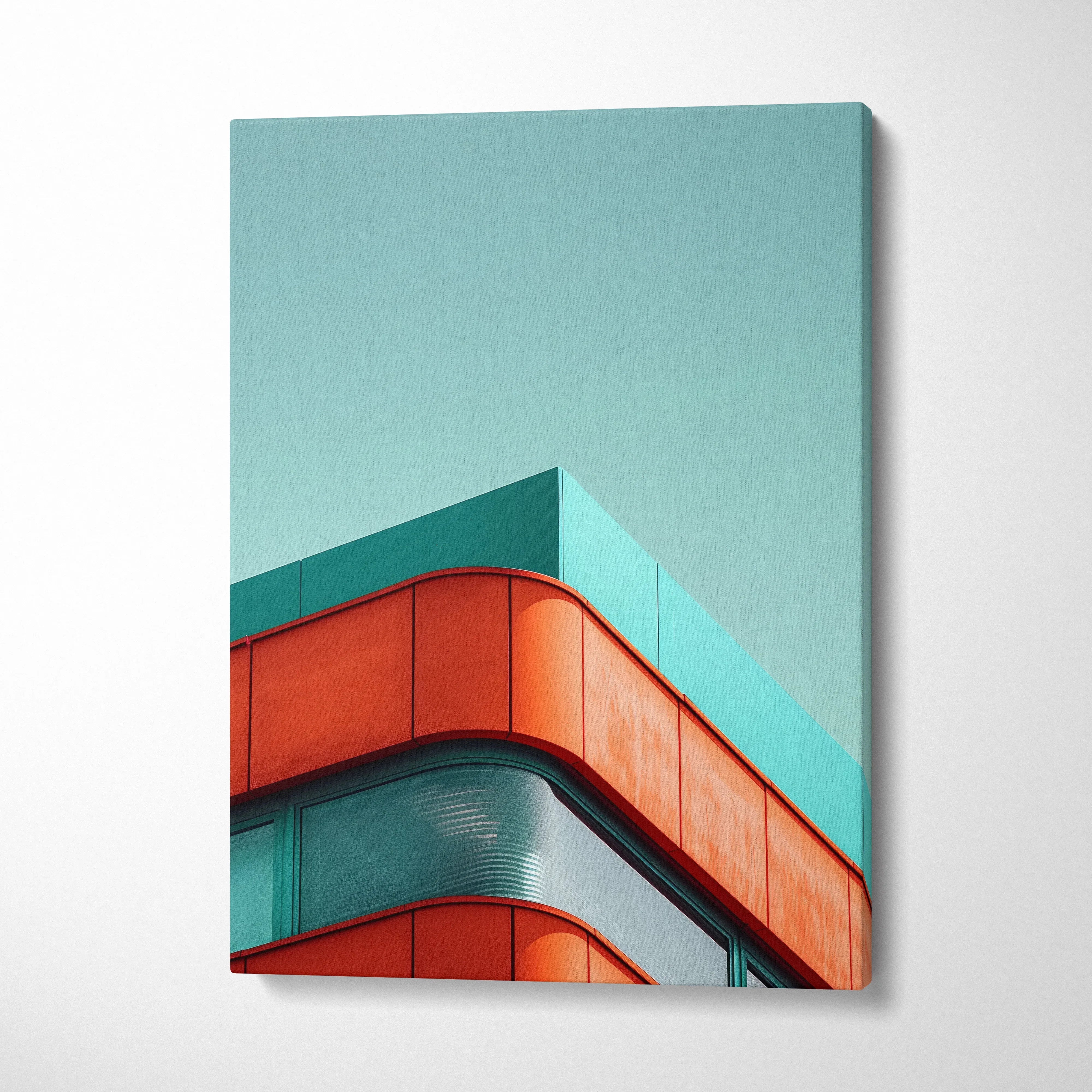 Modern building corner with teal and orange geometric design on vertical canvas wall art.