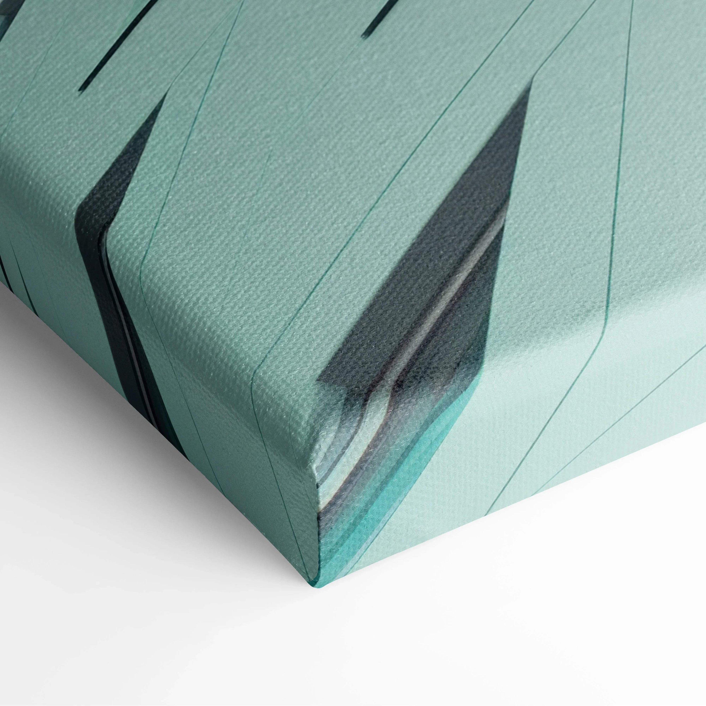 Close-up of premium digital canvas art featuring abstract geometric shapes in teal and black tones.