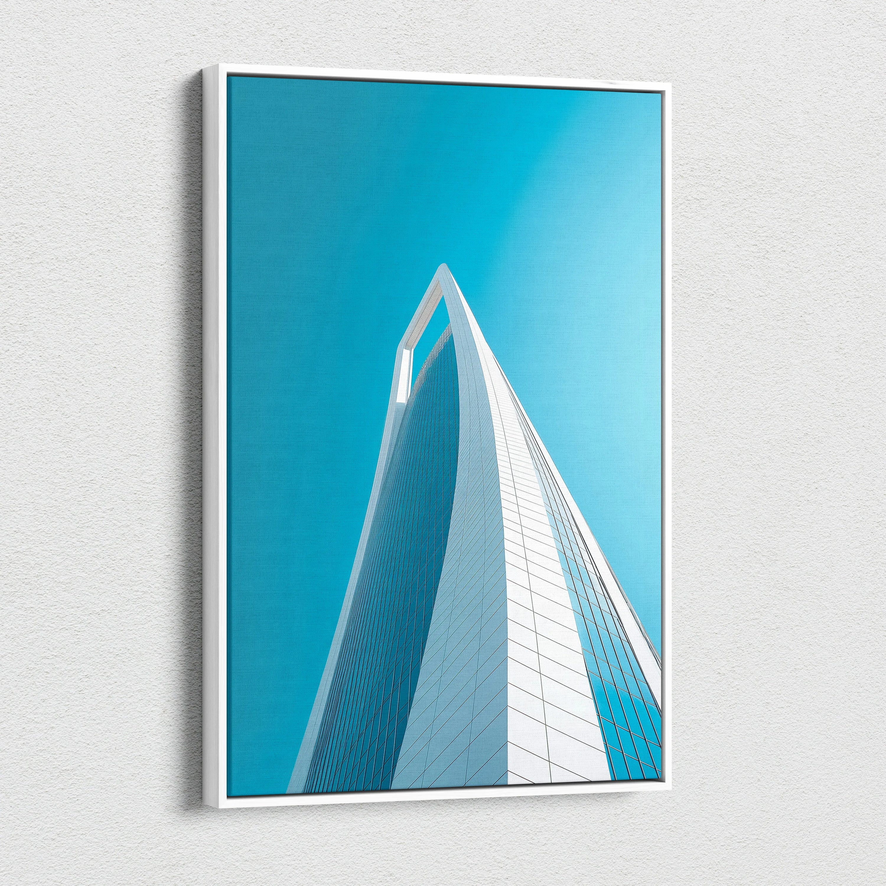 Vertical canvas art featuring striking modern building architecture against a clear blue sky, digital wall art print.