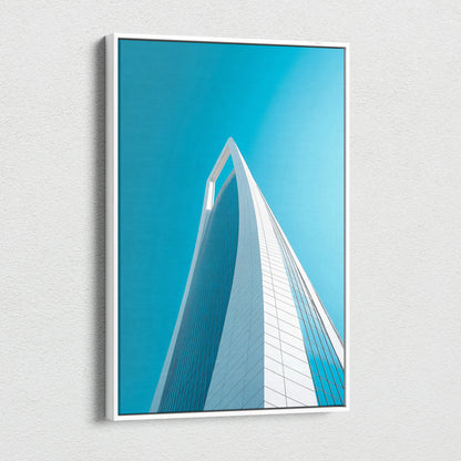 Vertical canvas art featuring striking modern building architecture against a clear blue sky, digital wall art print.