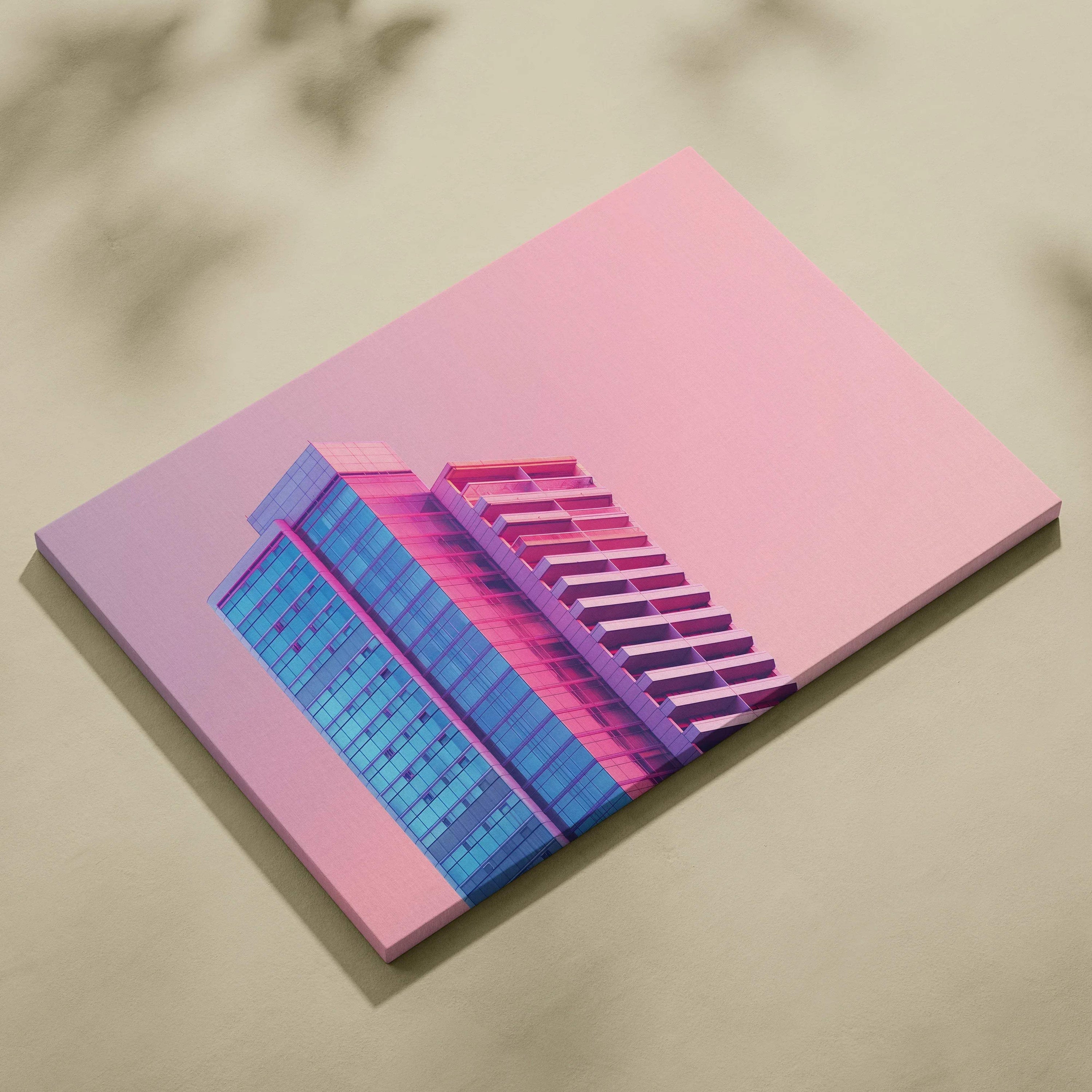Canvas wall art featuring modern architectural building in blue and purple tones against a pink background.