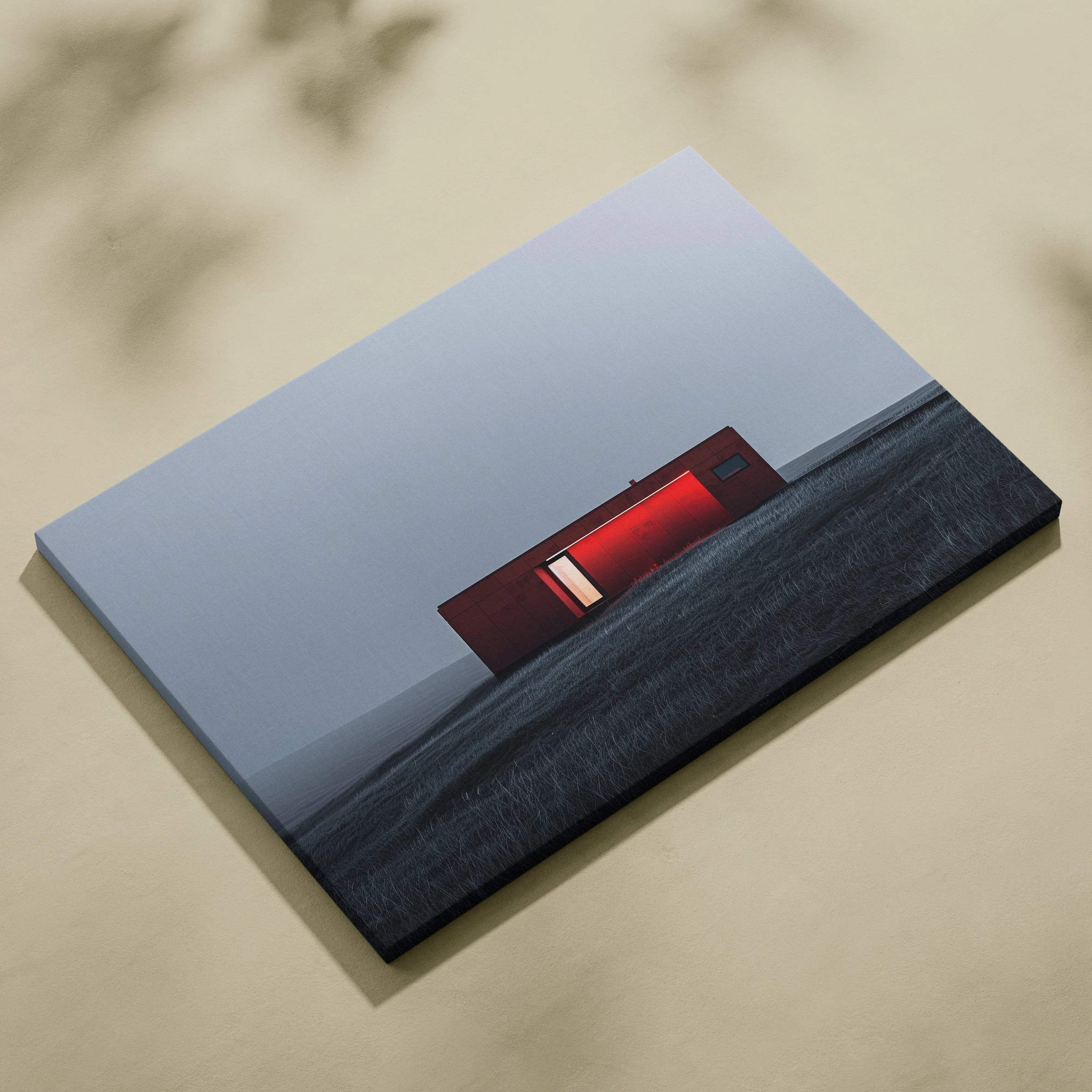 Rectangular canvas art print featuring minimalist red building against a muted gray sky and ground, modern architectural.