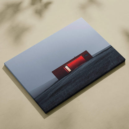 Rectangular canvas art print featuring minimalist red building against a muted gray sky and ground, modern architectural.