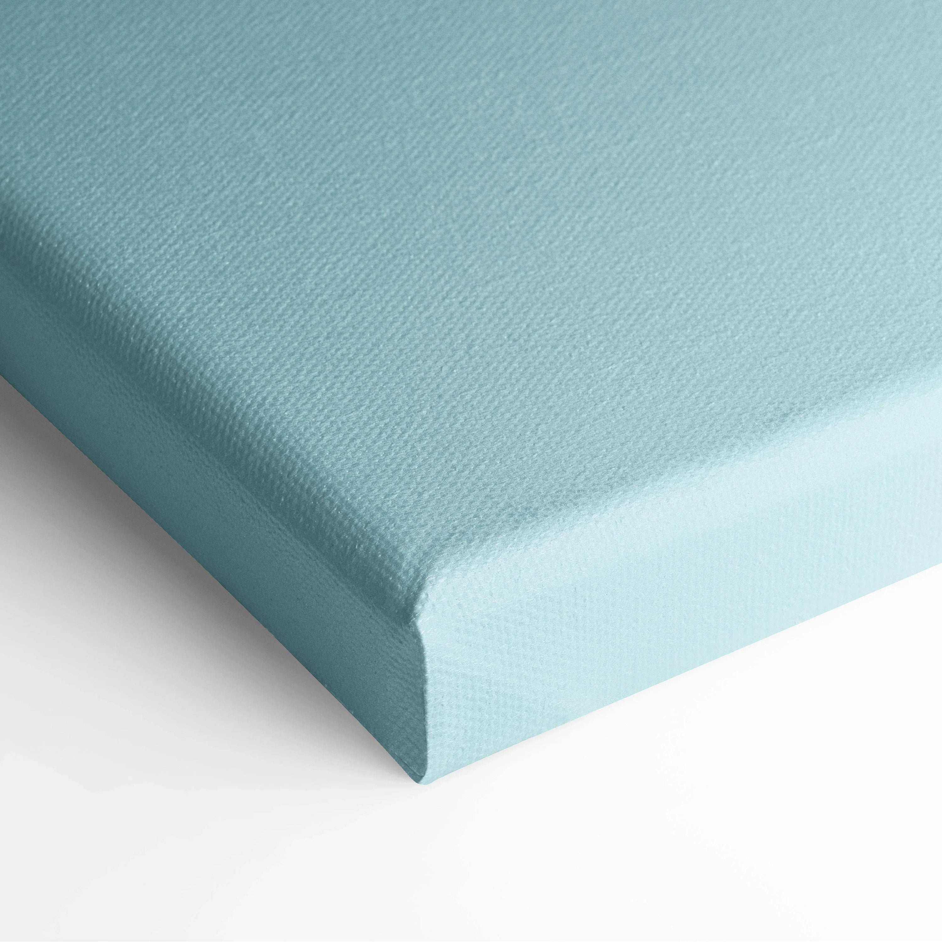 Light blue canvas wrap with a smooth texture, stretched tightly over a square wooden frame for wall art display.