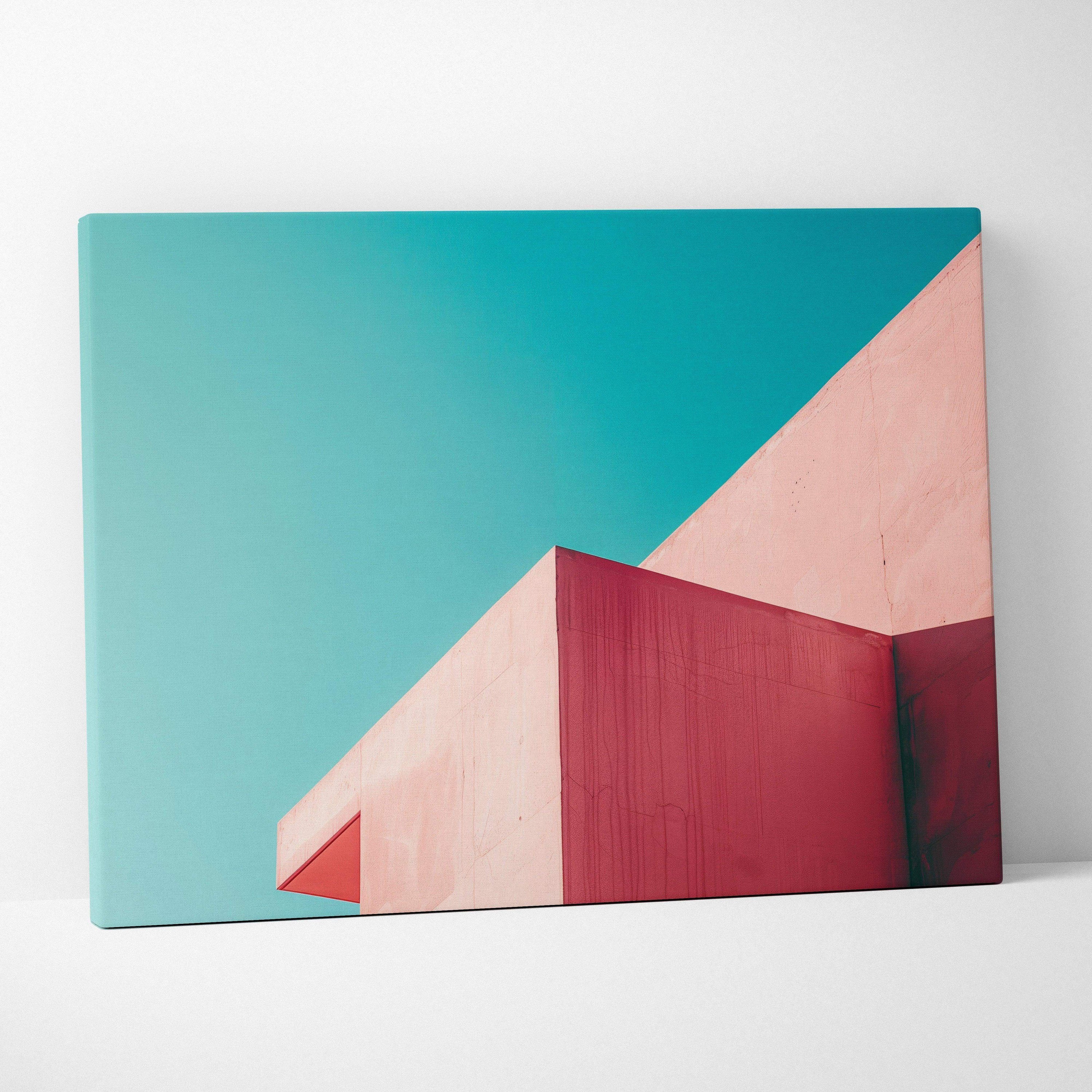 Canvas wall art featuring abstract architectural shapes in coral pink and deep red against a turquoise sky.