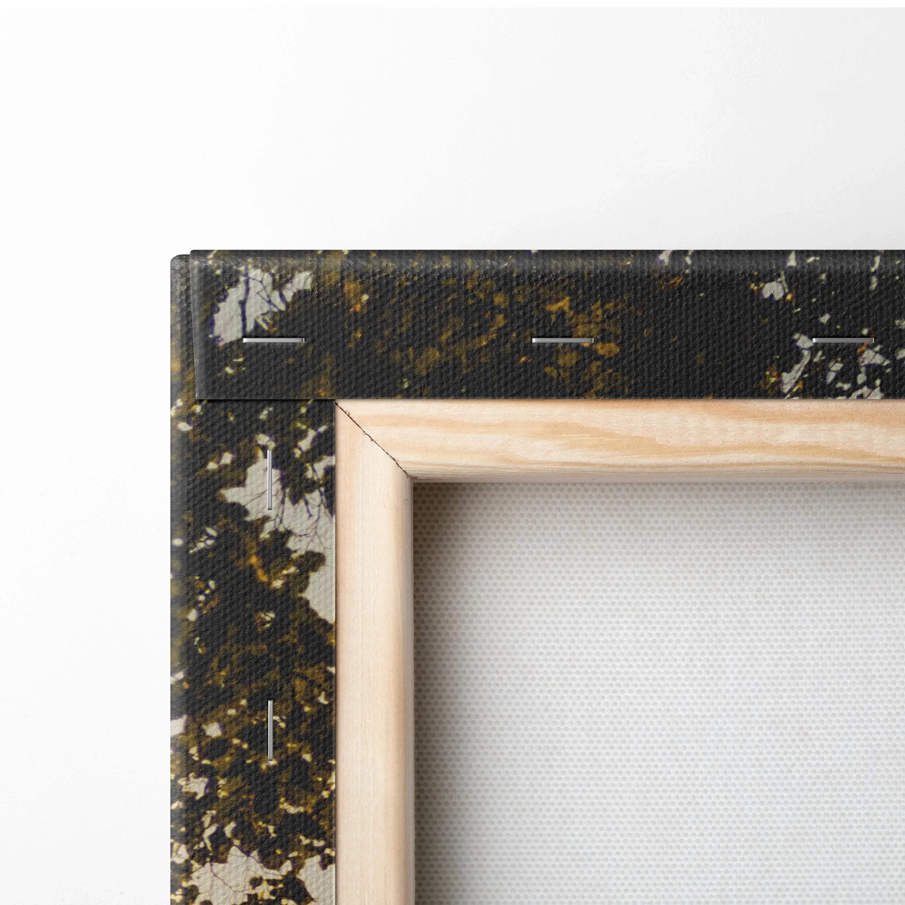 Close-up of wooden stretcher frame and wrapped canvas corner for wall art print.